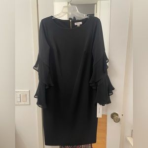 Calvin Klein with tags never worn size 12 black dress